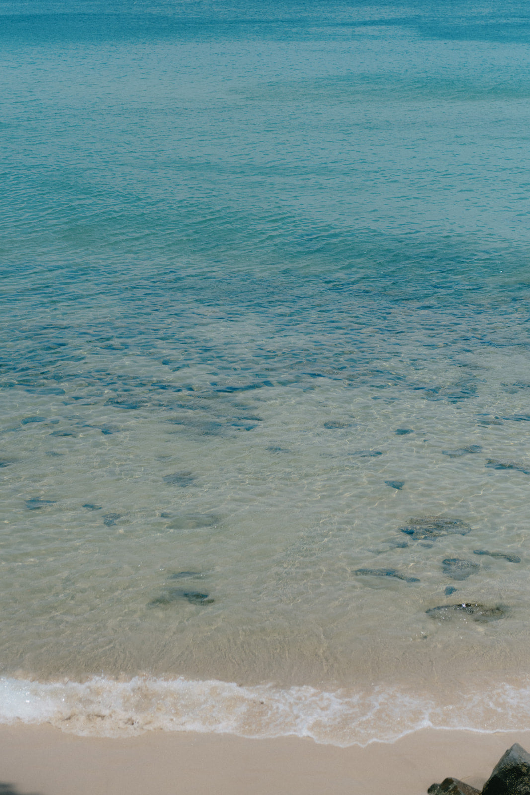 Beach scene reflecting the coastal lifestyle behind Ninth Wave Skin Co.