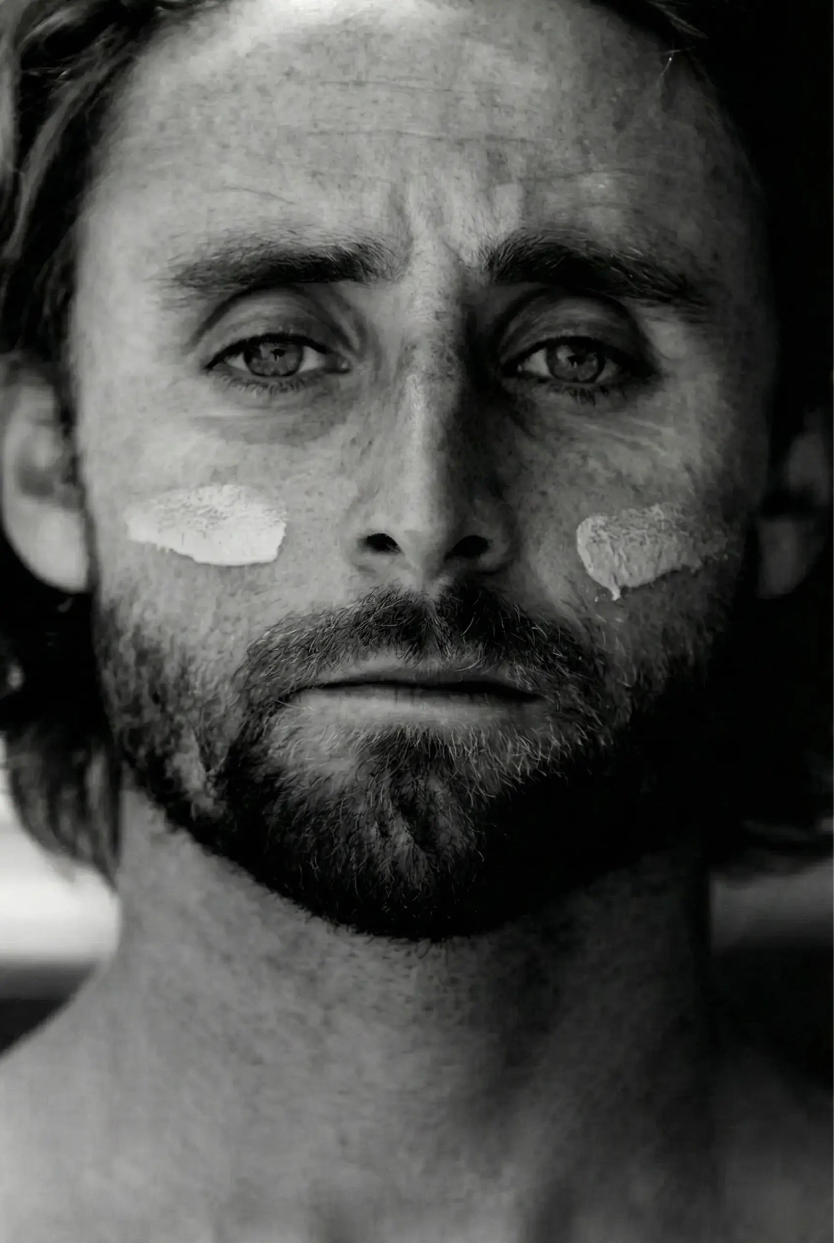 High-contrast black and white photo emphasising sun damage and facial lines